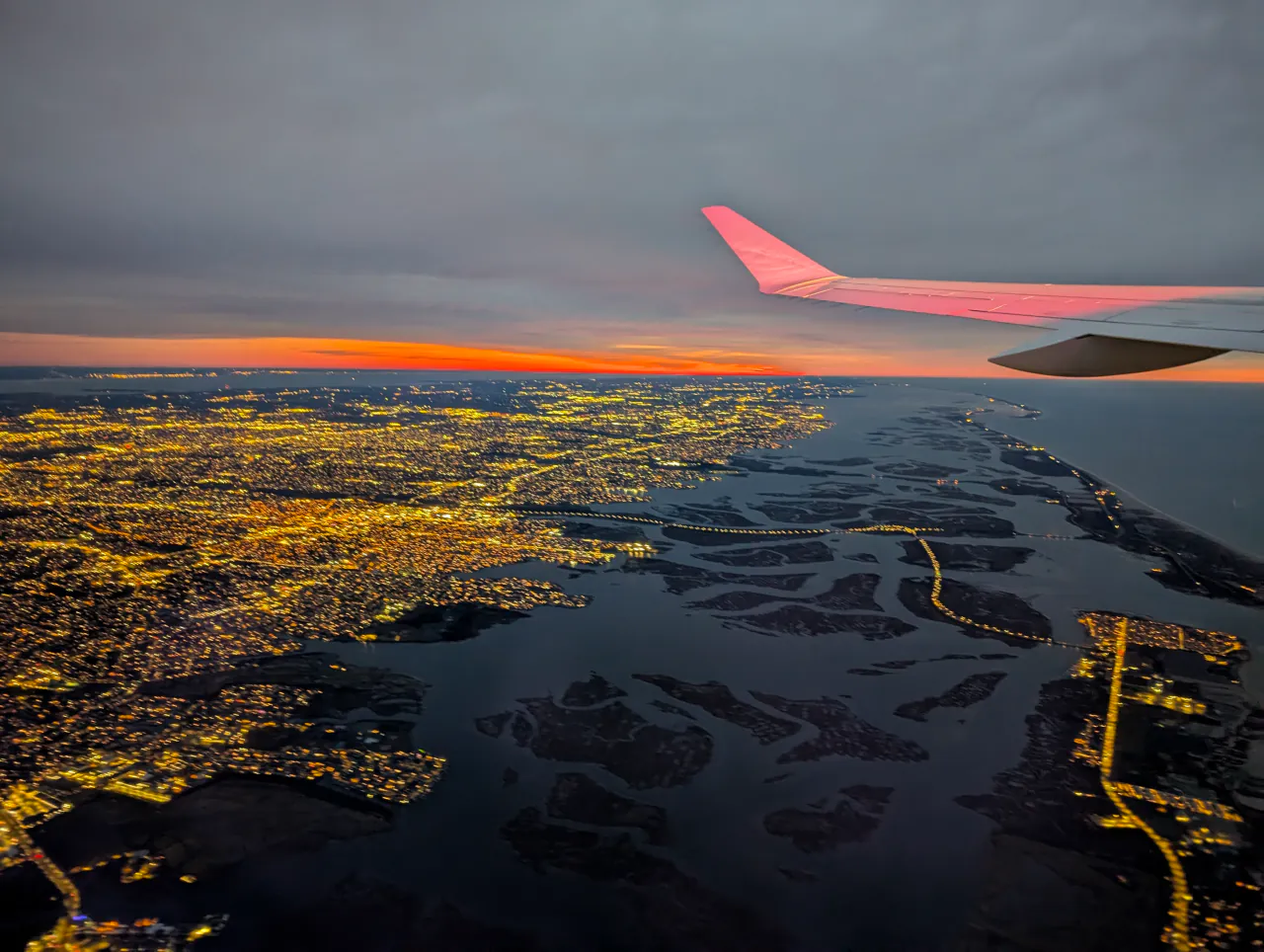Sunrise over NYC from a plane